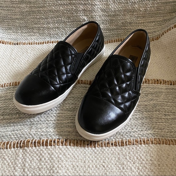 steve madden black leather slip ons